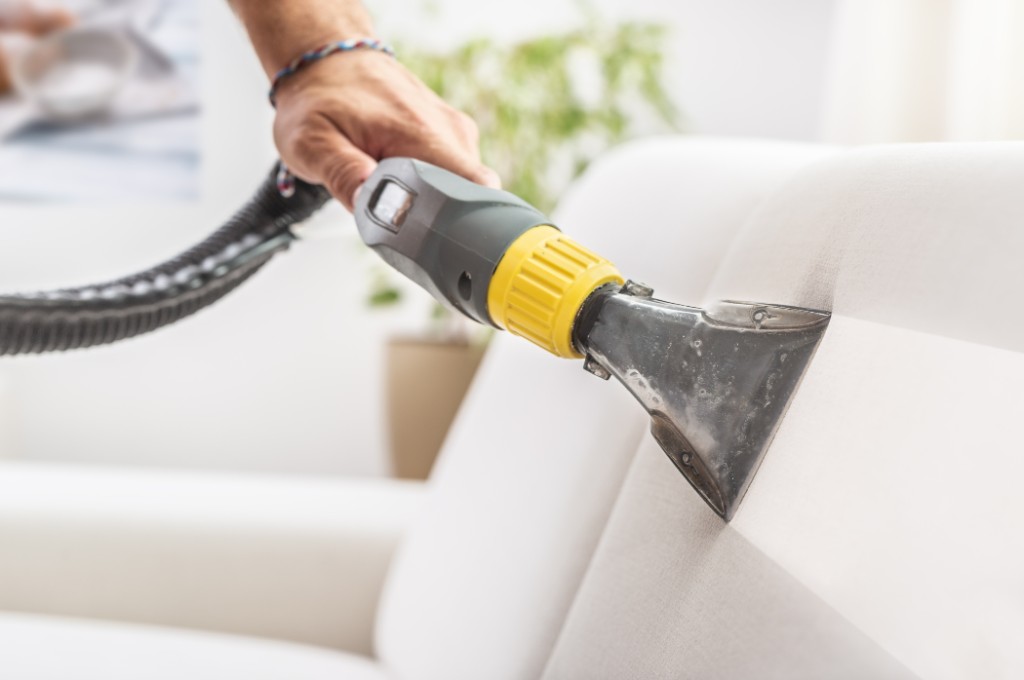 Professional upholstery cleaning in a rental living room